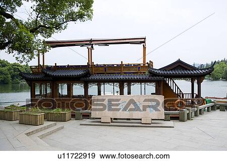 Stock Photo - Lotus Stirred by Breeze in Quyuan Garden in Hangzhou, Zhejiang Province. Fotosearch