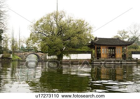 Stock Image - Scenery of West Lake in Hangzhou, Zhejiang Province. Fotosearch