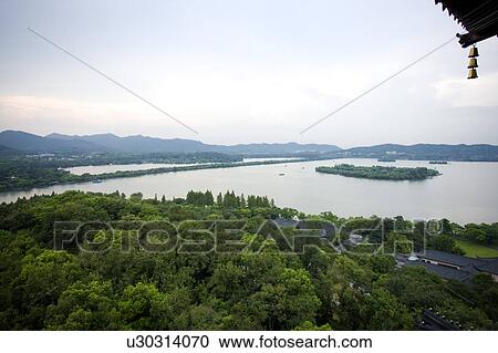 Stock Image - Scenery of West Lake in Hangzhou, Zhejiang Province. Fotosearch