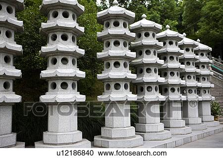 Stone towers in a row of West Lake, Hangzhou, Zhejiang Province View Large Photo Image Stock Image - Stone towers in a row of West Lake, Hangzhou, Zhejiang Province. Fotosearch