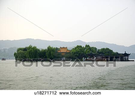 Stock Image - The mid-lake pavilion in West Lake, Hangzhou, Zhejiang Province. Fotosearch