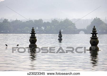 Three Pools Reflecting the Moon in west lake, Hangzhou, Zhejiang Province View Large Photo Image Stock Photography - Three Pools Reflecting the Moon in west lake, Hangzhou, Zhejiang Province. Fotosearch