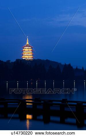 Stock Image - West Lake at night in Hangzhou, Zhejiang Province. Fotosearch