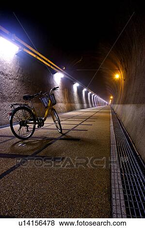 Stock Photo - A bicycle in the tunnel in Fulong Village, Gongliao Township, Taipei County, Taiwan. Fotosearch
