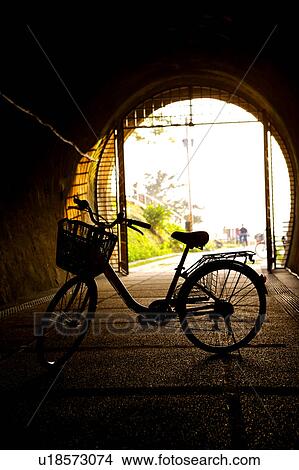 A bicycle in tunnel in Fulong Village, Gongliao Township, Taipei County, Taiwan View Large Photo Image Picture - A bicycle in tunnel in Fulong Village, Gongliao Township, Taipei County, Taiwan. Fotosearch