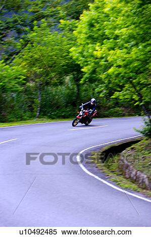 One people riding motorcycle in Taoyuan, Taiwan View Large Photo Image Stock Photography - One people riding motorcycle in Taoyuan, Taiwan. Fotosearch