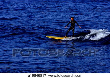 One people surfing in Mushung Harbor, Yilan, Taiwan View Large Photo Image Stock Photo - One people surfing in Mushung Harbor, Yilan, Taiwan. Fotosearch