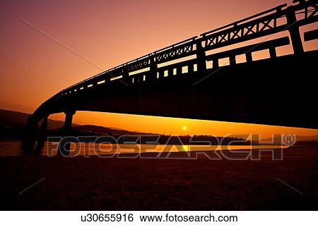 Silhouette of Caihong Bridge in Fulong Beach, Fulong Village, Gongliao Township, Taipei County, Taiwan View Large Photo Image Stock Photograph - Silhouette of Caihong Bridge in Fulong Beach, Fulong Village, Gongliao Township, Taipei County, Taiwan. Fotosearch