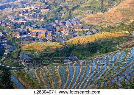 Stock Image - Longji Terraced Field and mountain fastness in Guilin, Guangxi Province, China. Fotosearch