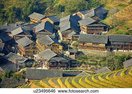 Stock Photograph - Longji Terraced Field and mountain fastness in Guilin, Guangxi Province, China. Fotosearch