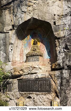 Statue of Buddha on the Elephant Trunk Hill in Guilin, Guangxi Province, China View Large Photo Image Stock Photo - Statue of Buddha on the Elephant Trunk Hill in Guilin, Guangxi Province, China. Fotosearch