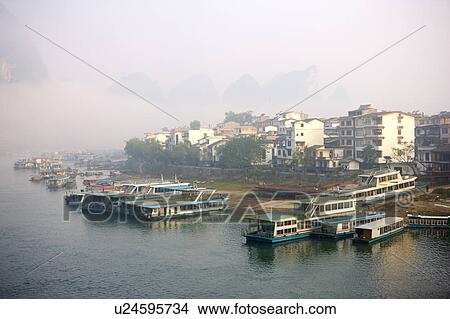 Picture - China, Guangxi Province, Guilin, Yangshuo, river traffic on Li River. Fotosearch