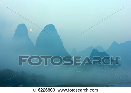 China, Guangxi Province, Guilin, Yangshuo, mountains at sunrise View Large Photo Image Stock Image - China, Guangxi Province, Guilin, Yangshuo, mountains at sunrise. Fotosearch
