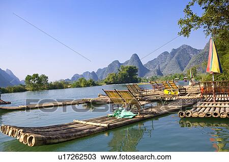 China, Guangxi Province, Guilin, Yangshuo, bamboo rafts on the Yulong River View Large Photo Image Stock Image - China, Guangxi Province, Guilin, Yangshuo, bamboo rafts on the Yulong River. Fotosearch