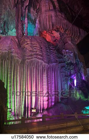 Stock Image - China, Guangxi Province, Guilin, Yangshuo, stalactites and stalagmites in Yinzi Cave. Fotosearch