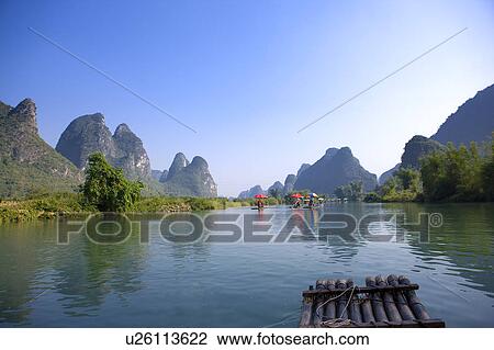China, Guangxi Province, Guilin, Yangshuo, Yulong River with mountain View Large Photo Image Stock Image - China, Guangxi Province, Guilin, Yangshuo, Yulong River with mountain. Fotosearch