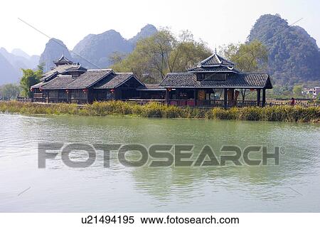 China, Guangxi Province, Guilin, Yangshuo, pavilions near the lake View Large Photo Image Stock Photography - China, Guangxi Province, Guilin, Yangshuo, pavilions near the lake. Fotosearch