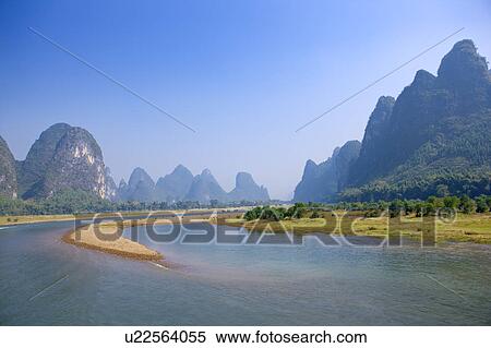 Stock Photography - China, Guangxi Province, Guilin, Yangshuo, Li River with mountains. Fotosearch