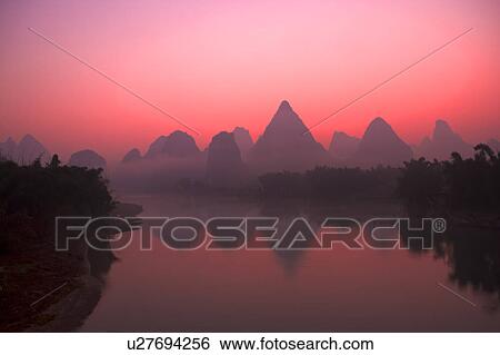 Stock Photograph - Li River with mountain, Yangshuo, Guilin, Guangxi Province, China. Fotosearch