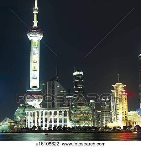 China, Shanghai, Pudong, Oriental Pearl Tower at night, low angle view View Large Photo Image Stock Image - China, Shanghai, Pudong, Oriental Pearl Tower at night, low angle view. Fotosearch