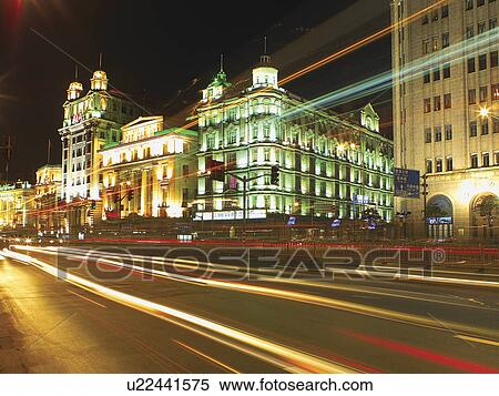 Stock Photography - China, Shanghai, Pudong, The Bund, night (blurred motion). Fotosearch