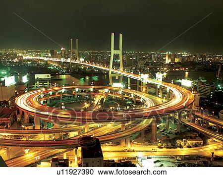 Stock Image - Shanghai, People's Republic of China. The Nanpu bridge, connecting Shanghai with the Pudong New Area, night view. Fotosearch