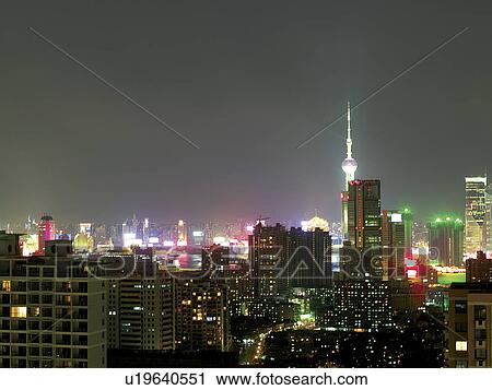 Stock Image - Skyline at night, Shanghai, China. Fotosearch