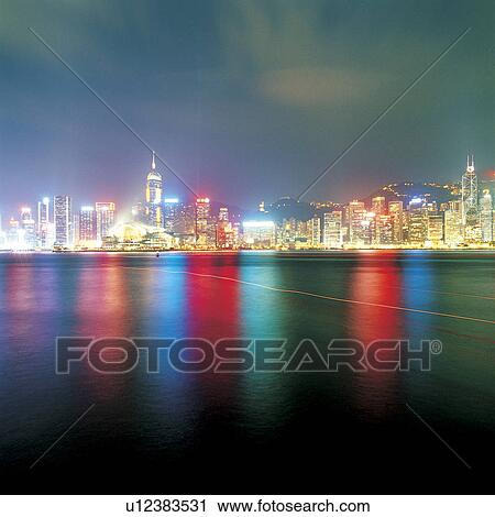 Stock Image - Victoria Harbor, Night scene. Fotosearch