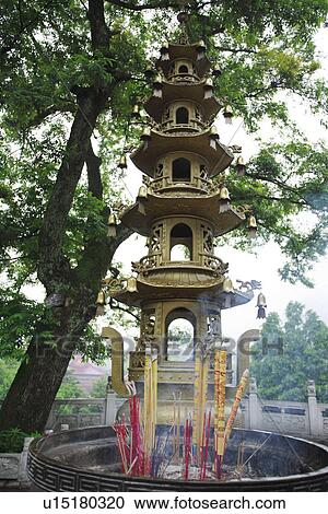 Stock Image - Incense burner and pagoda. Fotosearch