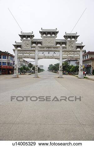 Stock Photo - Memorial archway lead to Mt. Jiuhua, Anhui, China, Asia. Fotosearch