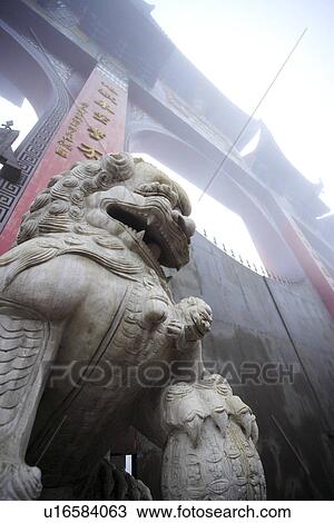 Stone lion by gate, The Ksitigarbha Temple, Mt. Jiuhua, Anhui, China, Asia View Large Photo Image Stock Image - Stone lion by gate, The Ksitigarbha Temple, Mt. Jiuhua, Anhui, China, Asia. Fotosearch