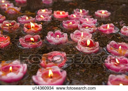 China, Sichuan Province, Mt. Emei, Wannian Temple, lit candles View Large Photo Image Picture - China, Sichuan Province, Mt. Emei, Wannian Temple, lit candles. Fotosearch