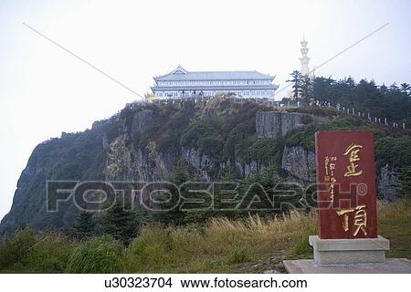 Picture - China, Sichuan Province, Mt. Emei, Woyun Buddha Temple and Golden Summit. Fotosearch