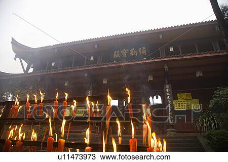 China, Sichuan Province, Mt. Emei, Wannian Temple, lit candles View Large Photo Image Stock Image - China, Sichuan Province, Mt. Emei, Wannian Temple, lit candles. Fotosearch