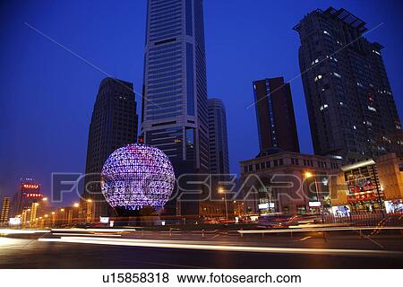Stock Photo - China, Liaoning Province, Friendship Square in night. Fotosearch