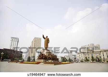 Stock Photo - China, Liaoning Province, Shenyang, Zhongshan Square with statue Of Mao Tse-Tung. Fotosearch