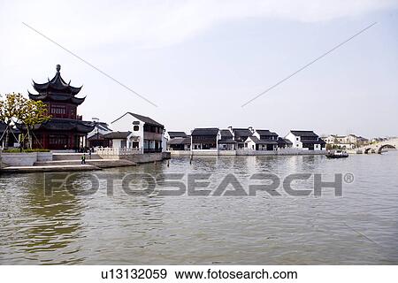 China, Suzhou, houses along the canal View Large Photo Image Stock Photo - China, Suzhou, houses along the canal. Fotosearch