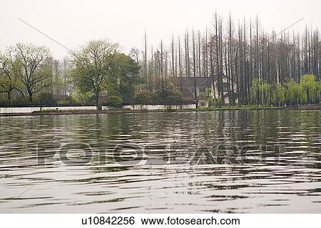 Stock Photograph - China, Zhejiang Province, Hangzhou, West Lake. Fotosearch