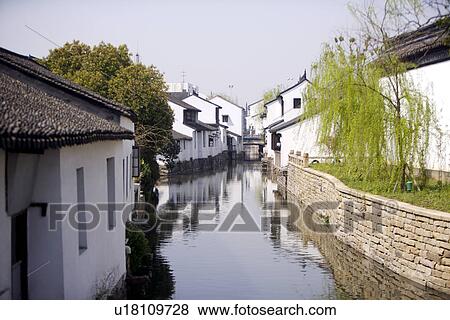 Suzhou, China, houses along the canal View Large Photo Image Stock Photo - Suzhou, China, houses along the canal. Fotosearch