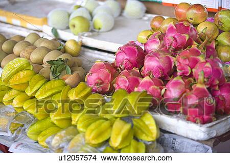 Picture - China,, Guangdong, Guangzhou, assorted fruit. Fotosearch