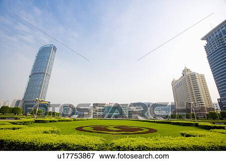 China, Guangdong, Guangzhou, Buildings and lawn View Large Photo Image Stock Photo - China, Guangdong, Guangzhou, Buildings and lawn. Fotosearch