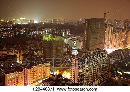 Stock Image - China,, Guangdong, Guangzhou, cityscape at night. Fotosearch