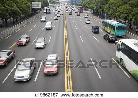 Stock Photo - China, Guangdong, Shenzhen, thoroughfare. Fotosearch