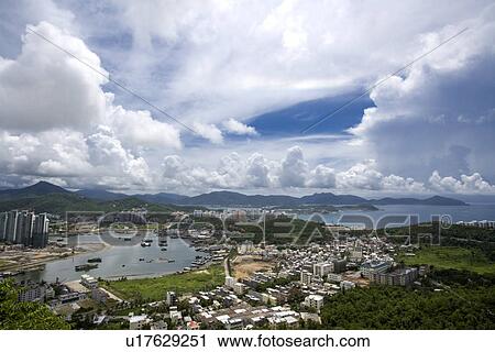 Stock Image - Asia, China, Hainan Island, Sanya, Cityscape. Fotosearch