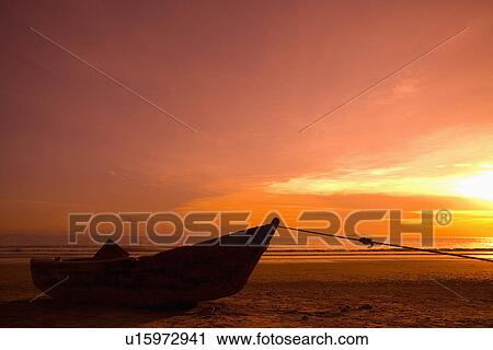 Sanya, Hainan, People's Republic of China. Fishing boat in sunset View Large Photo Image Stock Image - Sanya, Hainan, People's Republic of China. Fishing boat in sunset. Fotosearch