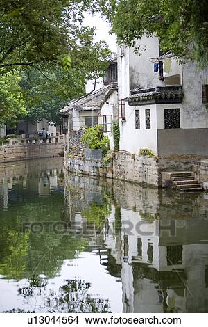 Picture - Asia, China, Jiangsu Province, Tongli Town, traditional residential houses in the water town. Fotosearch