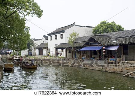 Picture - Asia, China, Jiangsu Province, Tongli Town, Rowing boats along the river in the water town. Fotosearch