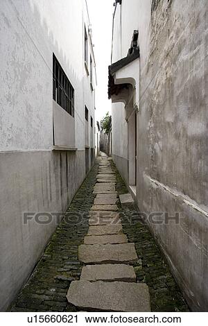 Stock Image - Asia, China, Jiangsu Province, Tongli Town, alley. Fotosearch