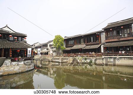 Asia, China, Zhejiang Province, Xitang Town, traditional residential houses in the water town View Large Photo Image Stock Photo - Asia, China, Zhejiang Province, Xitang Town, traditional residential houses in the water town. Fotosearch