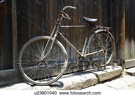 China, Zhejiang Province, Wuzhen, Old bike in alley View Large Photo Image Stock Image - China, Zhejiang Province, Wuzhen, Old bike in alley. Fotosearch